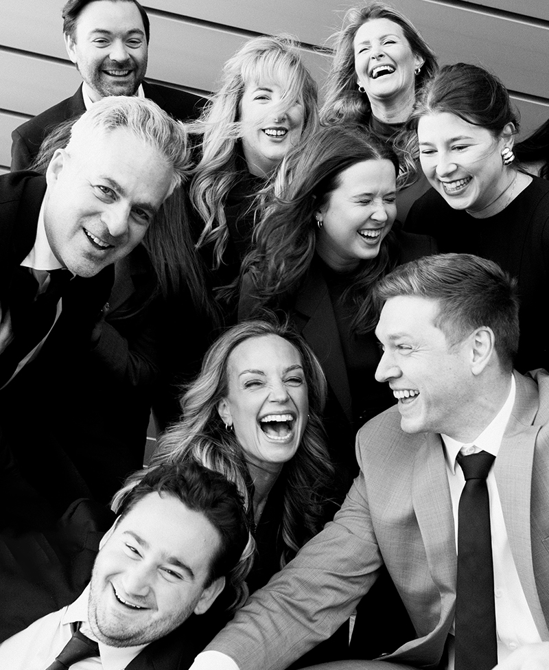 Fox Marin team smiling and laughing together